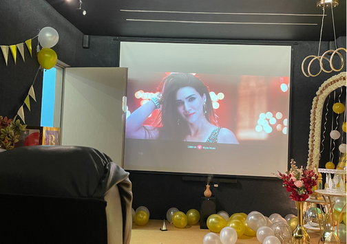 Private mini theater with large cinema screen ready for a private movie screening